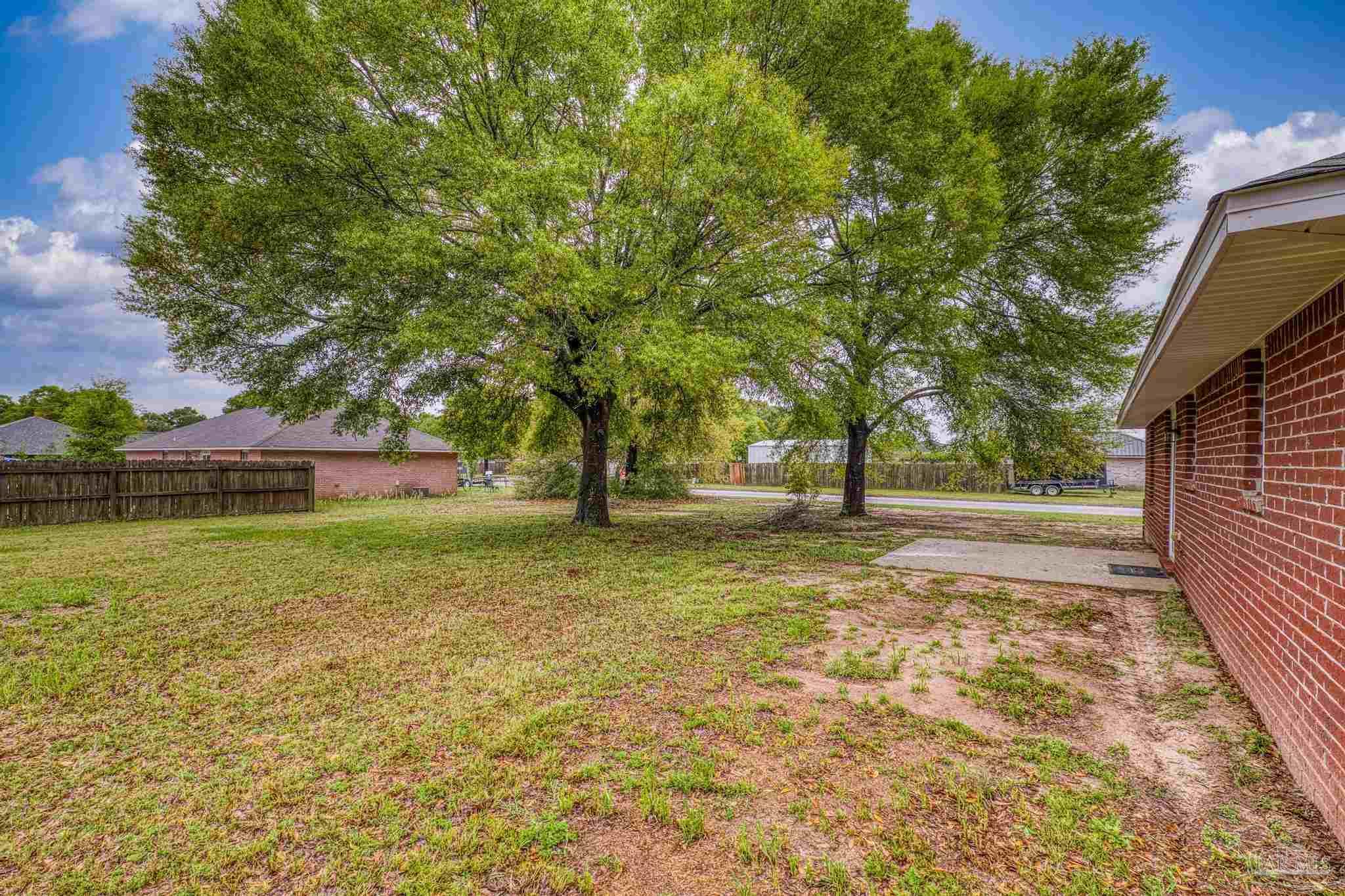 5564 Paddle Wheel Drive Milton, FL 32583 - Photo 34 of 41 a view of backyard with outdoor space