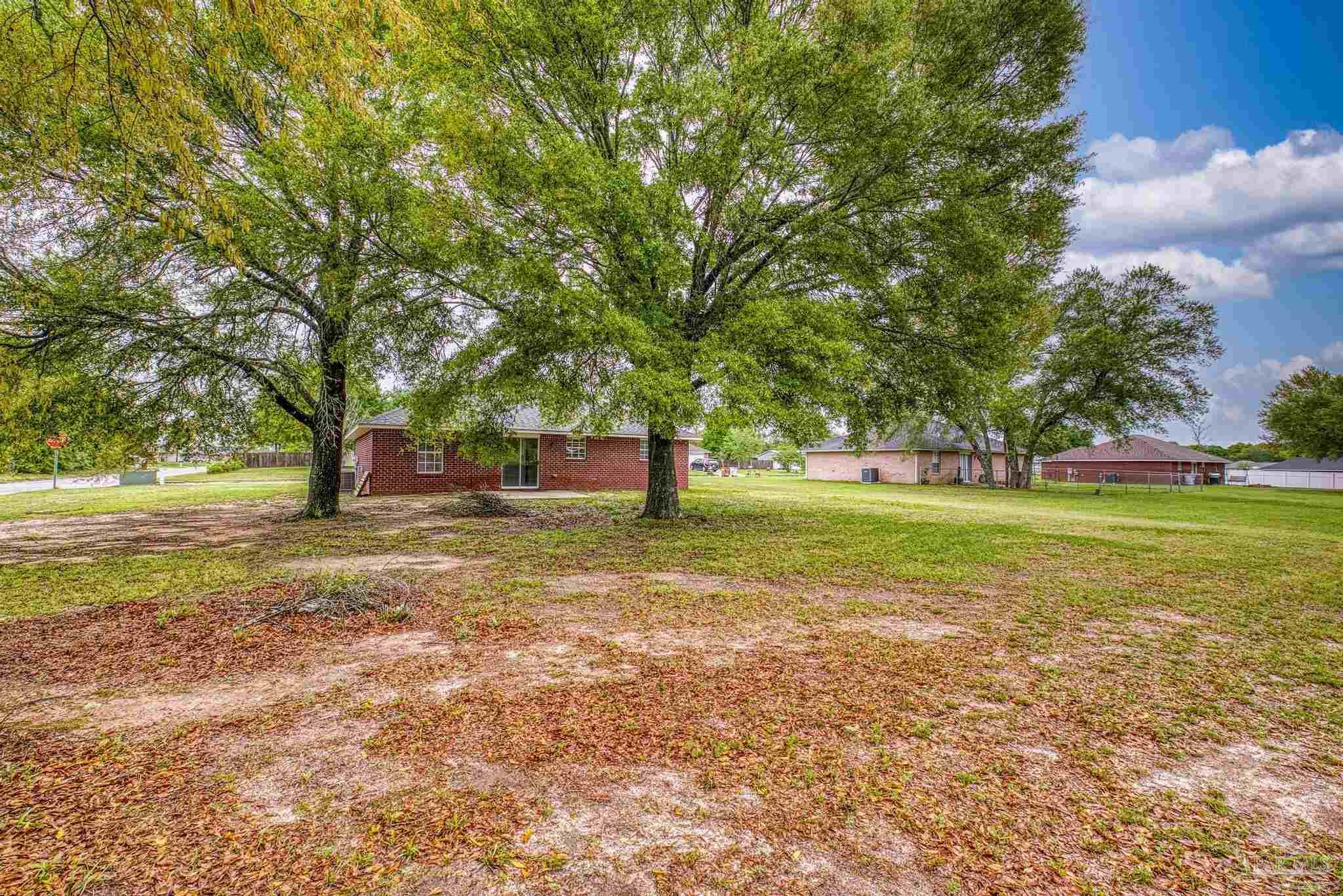 5564 Paddle Wheel Drive Milton, FL 32583 - Photo 39 of 41 a view of a trees in a park