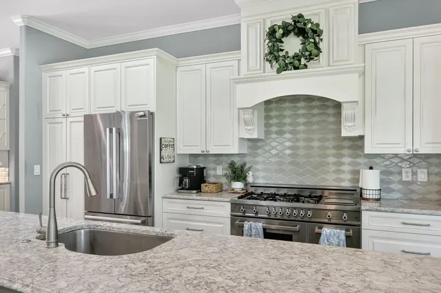 a view of room with furniture and a window