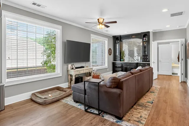 a en suite bathroom with double vanity and a mirror