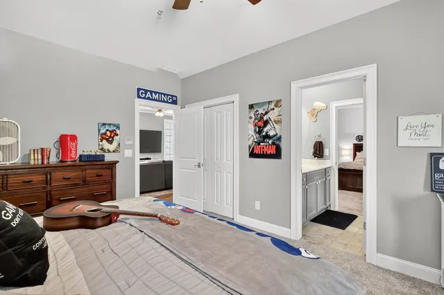 a view of a patio with a table chairs and a backyard