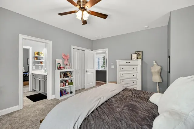 an aerial view of a house with yard and outdoor seating