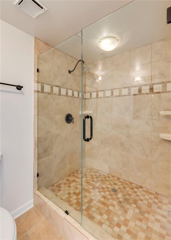 Undisclosed Address Atlanta, GA 30326 - Photo 17 of 38 a bathroom with a shower