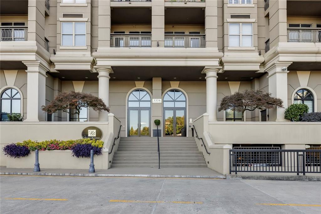 Undisclosed Address Atlanta, GA 30326 - Photo 2 of 38 a front view of a building with glass windows