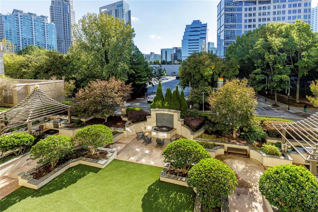 Undisclosed Address Atlanta, GA 30326 - Photo 23 of 38 a view of a garden with lawn chairs