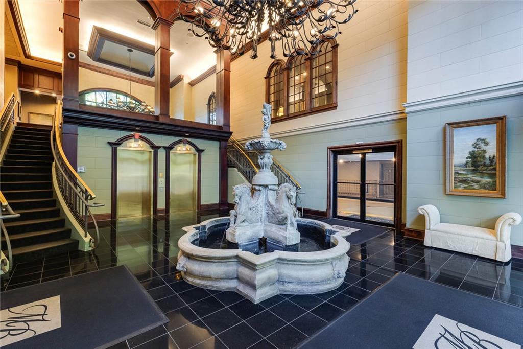 Undisclosed Address Atlanta, GA 30326 - Photo 24 of 38 a view of a patio with couches table and chairs and potted plants