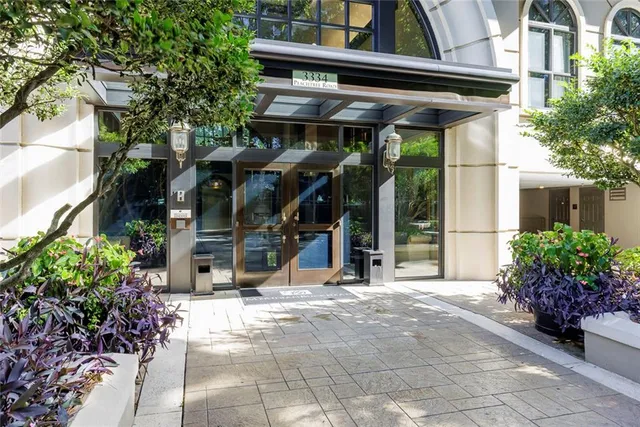 a view of a chairs and table in the patio
