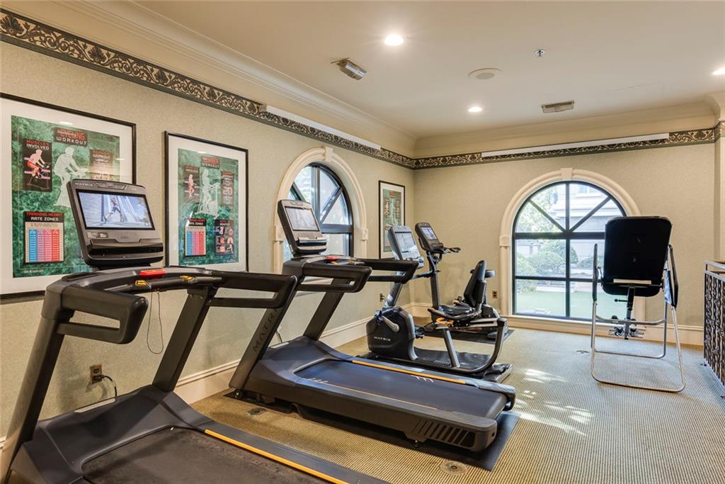 Undisclosed Address Atlanta, GA 30326 - Photo 32 of 38 a view of a room with gym equipment