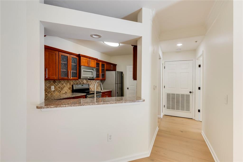 Undisclosed Address Atlanta, GA 30326 - Photo 9 of 38 a view of a bathroom with mirror and window