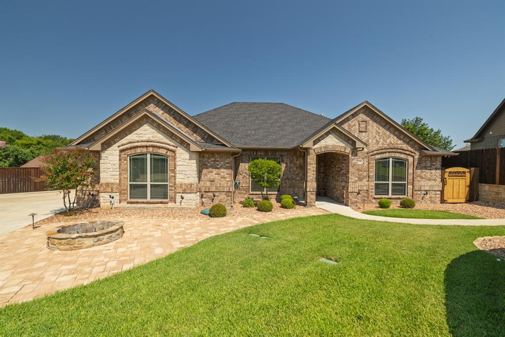 Gorgous one owner family Custom Home, 1930 square foot and features are very upscale. Professional landscaping and easy to maintain flower beds with custom rocks.  But the best is yet to come with 430 sq foot workshop and separae 3 car oversized garage