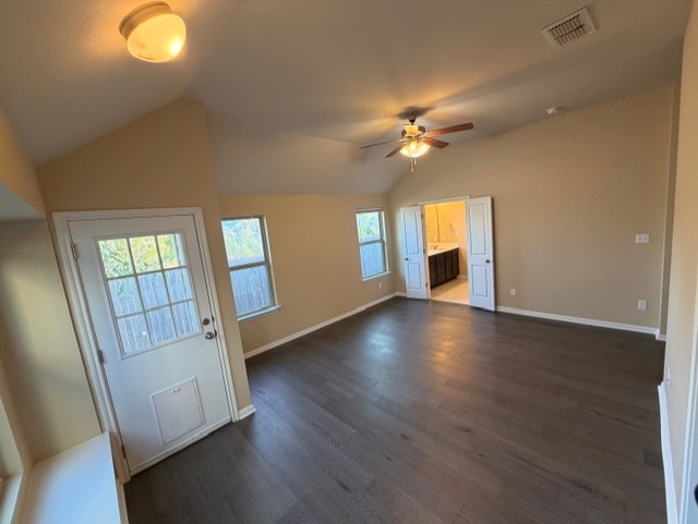 918 Silo Street San Marcos, TX 78666 - Photo 15 of 24 a view of an empty room with a window and wooden floor