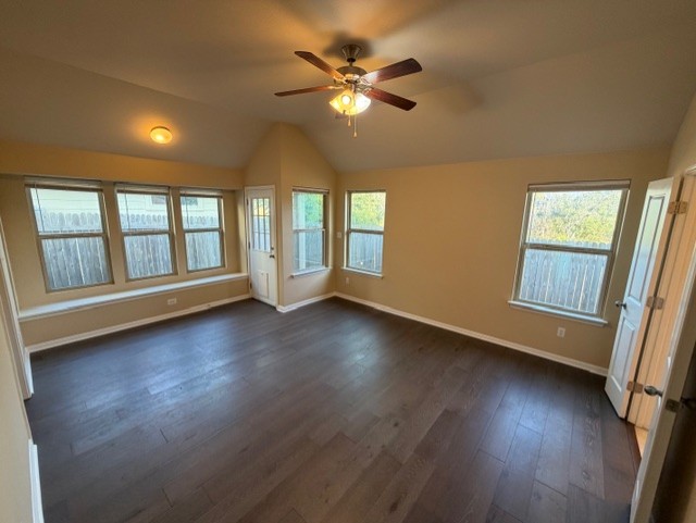 918 Silo Street San Marcos, TX 78666 - Photo 16 of 24 a view of an empty room with wooden floor and a window