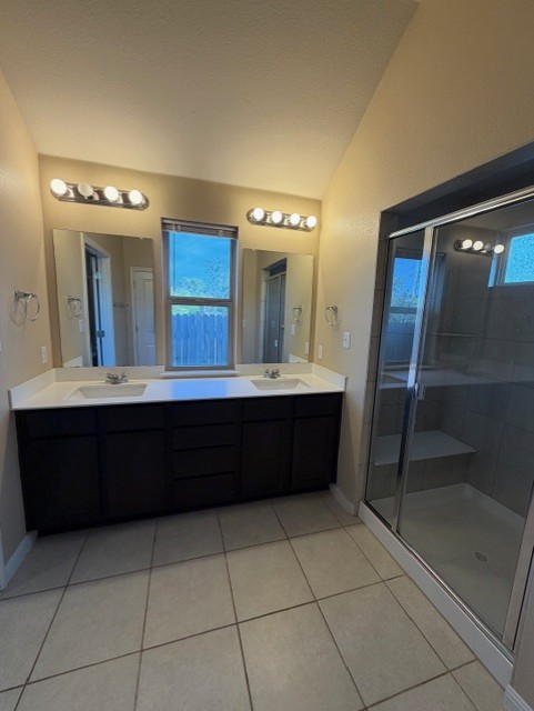 918 Silo Street San Marcos, TX 78666 - Photo 17 of 24 a bathroom with a sink vanity and a mirror