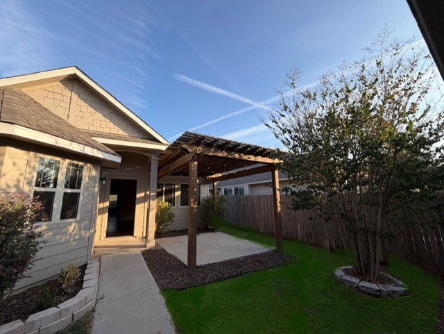 918 Silo Street San Marcos, TX 78666 - Photo 3 of 24 a front view of a house with garden