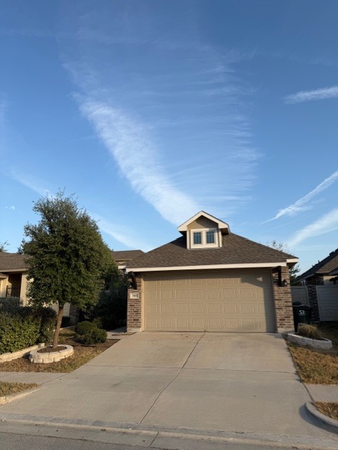 918 Silo Street San Marcos, TX 78666 - Photo 4 of 24 a front view of a house with a yard