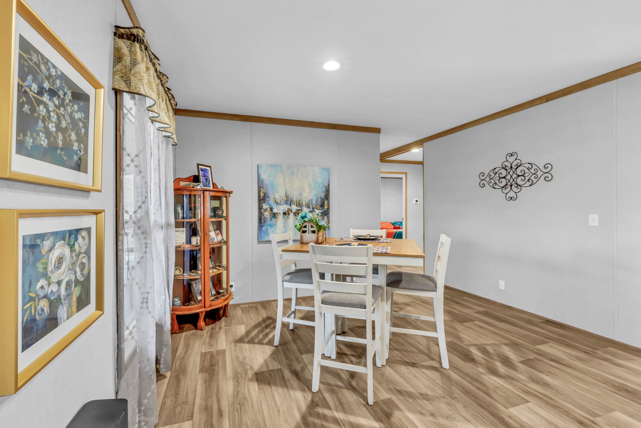 124 Old Lafayette Road Big Rock, TN 37023 - Photo 34 of 62 a dining room with furniture and a book shelf