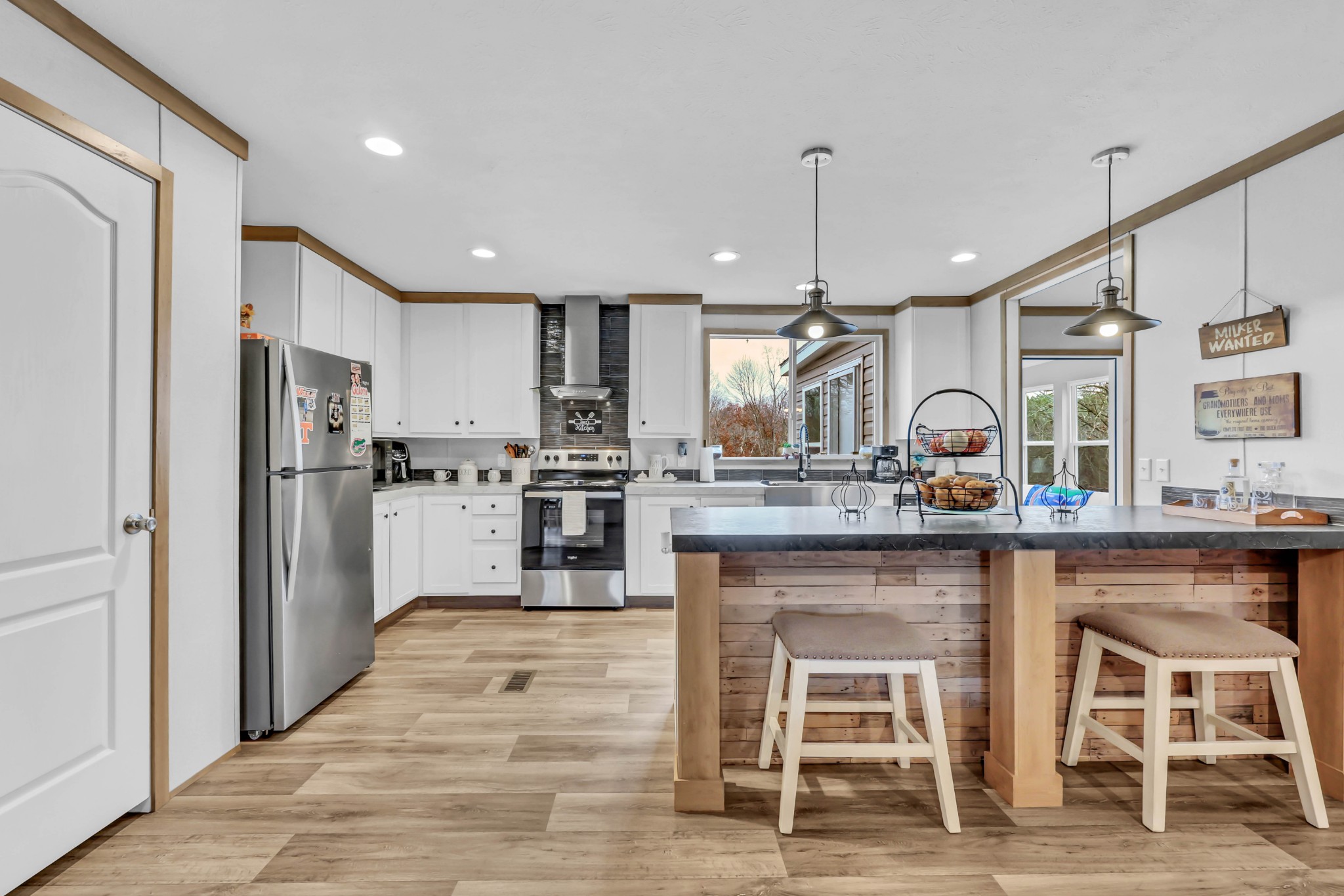 124 Old Lafayette Road Big Rock, TN 37023 - Photo 36 of 62 a kitchen with stainless steel appliances kitchen island granite countertop a refrigerator and a stove top oven