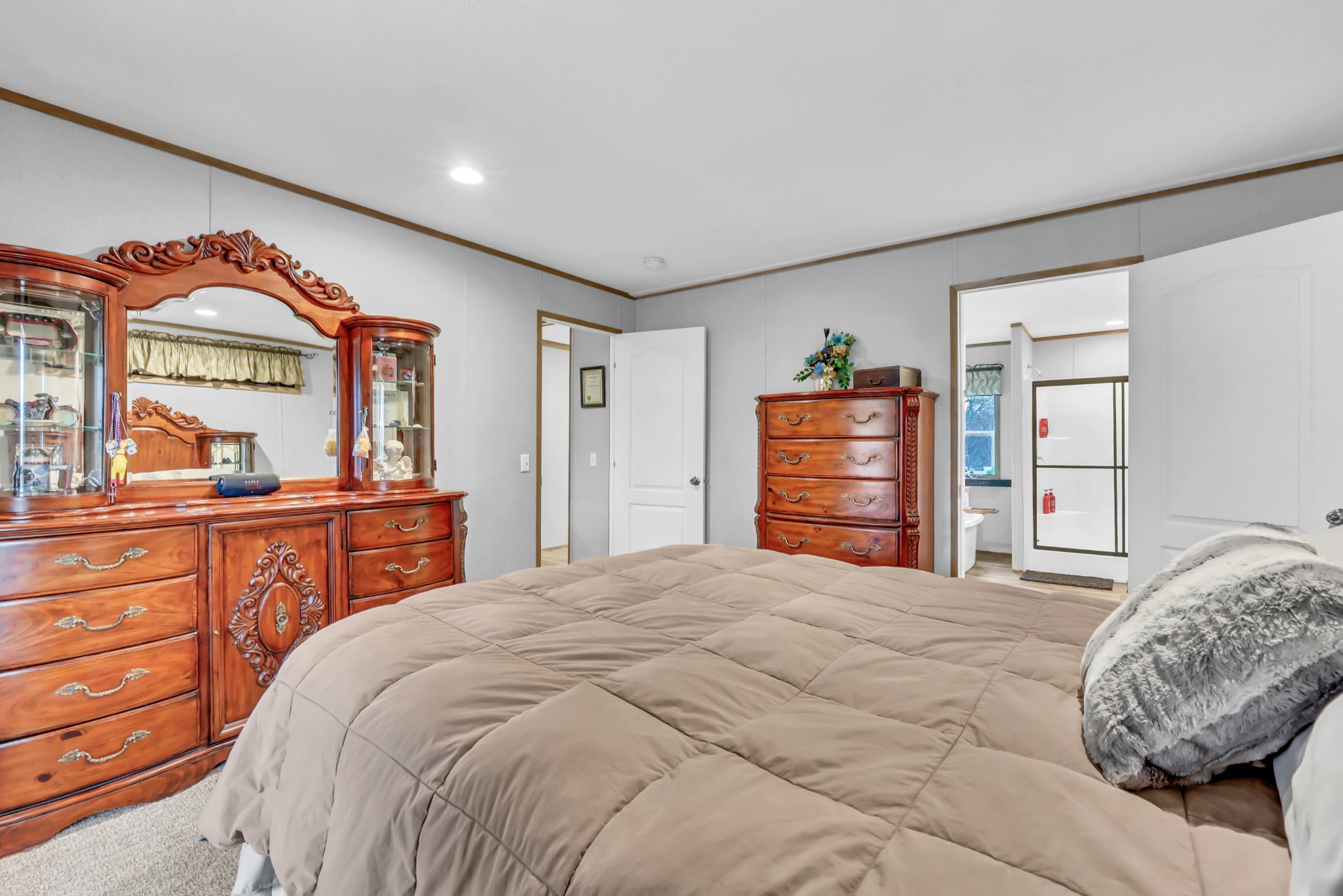 124 Old Lafayette Road Big Rock, TN 37023 - Photo 41 of 62 a bedroom with a bed and a dresser