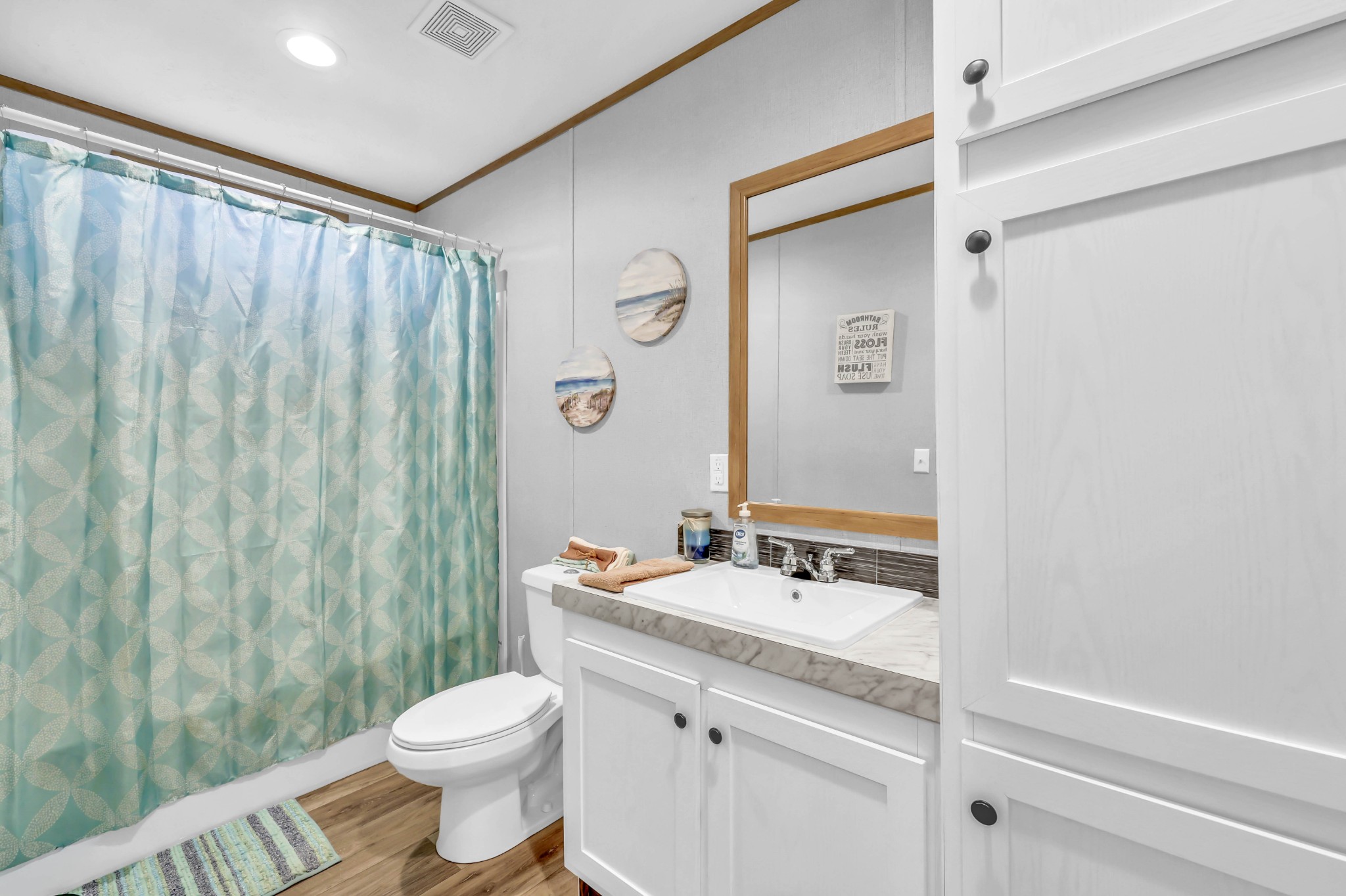 124 Old Lafayette Road Big Rock, TN 37023 - Photo 51 of 62 a bathroom with a sink a toilet and shower