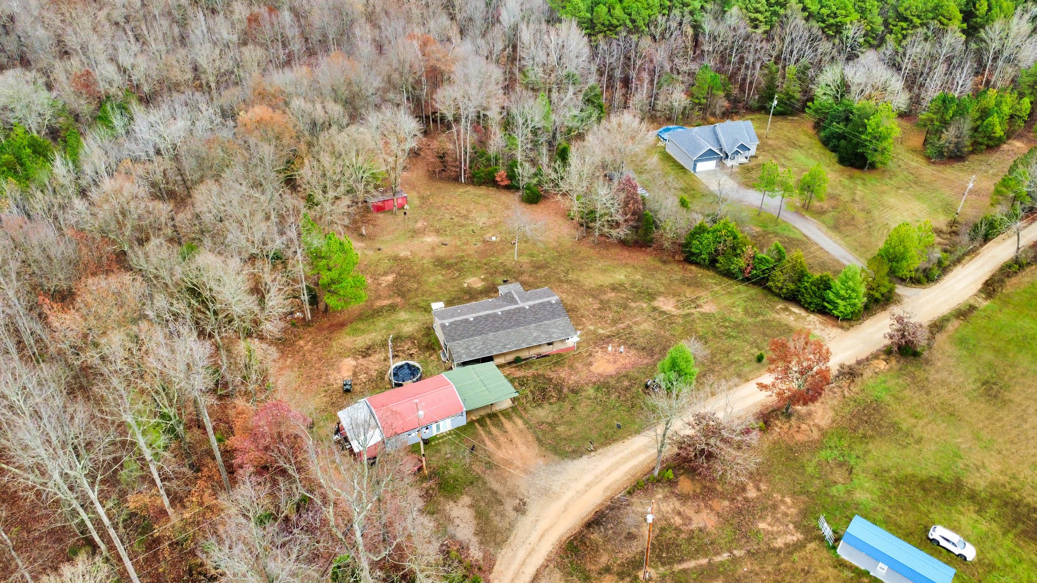 124 Old Lafayette Road Big Rock, TN 37023 - Photo 7 of 62 an aerial view of a house with a yard and lake view
