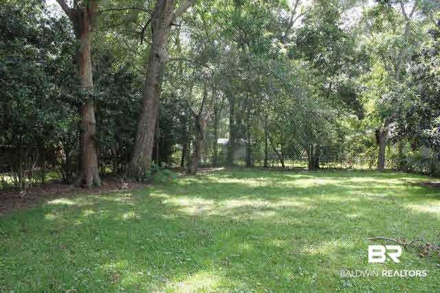 18832 Florida Street Robertsdale, AL 36567 - Photo 3 of 20 Pretty shaded back yard.