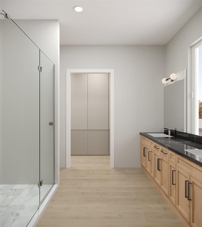 475 Lessie Circle Kennedale, TX 76060 - Photo 9 of 17 a bathroom with a granite countertop sink a mirror and a shower