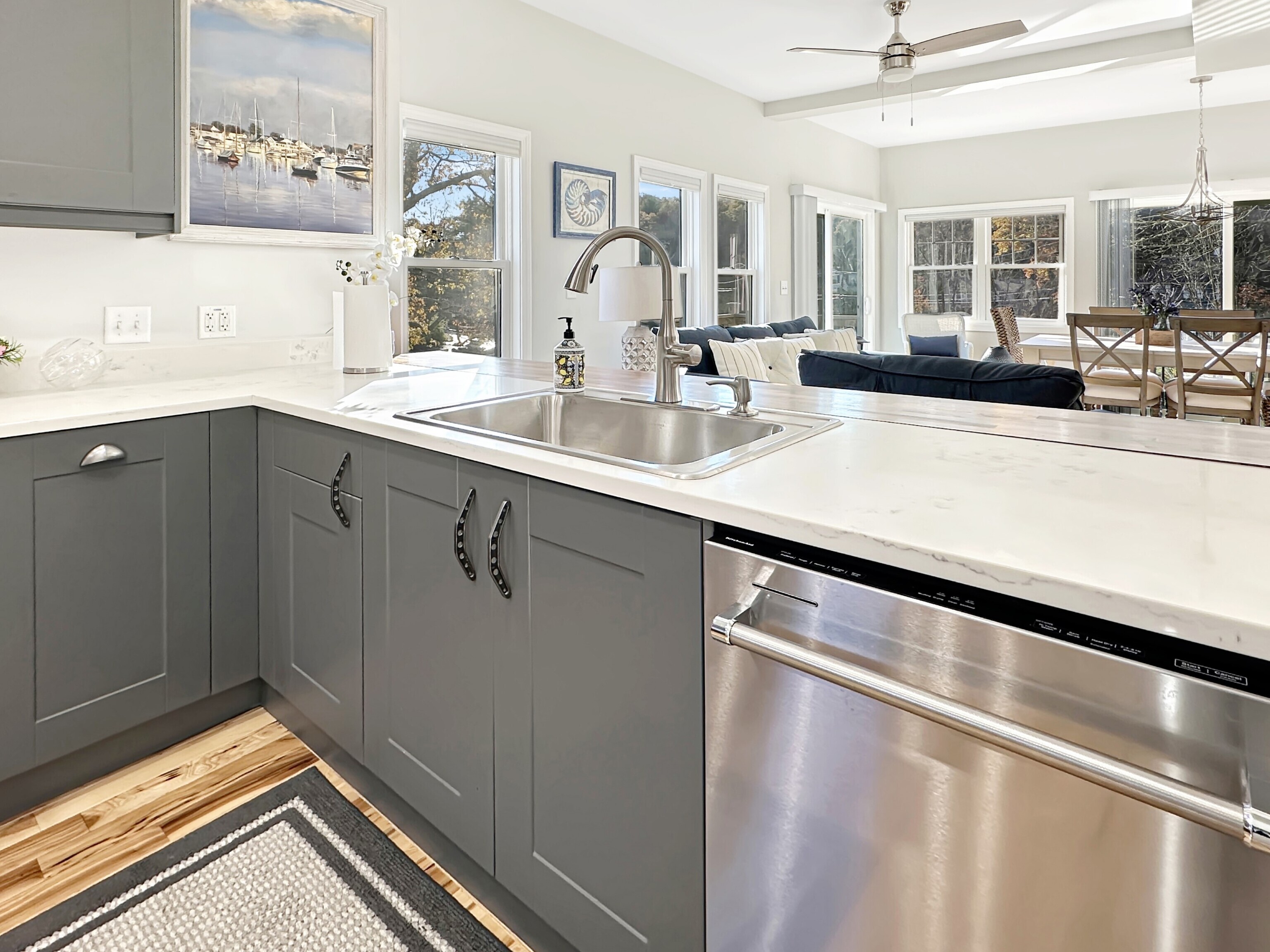 276 Niantic River Road Waterford, CT 06385 - Photo 13 of 40 a kitchen with a sink and a refrigerator