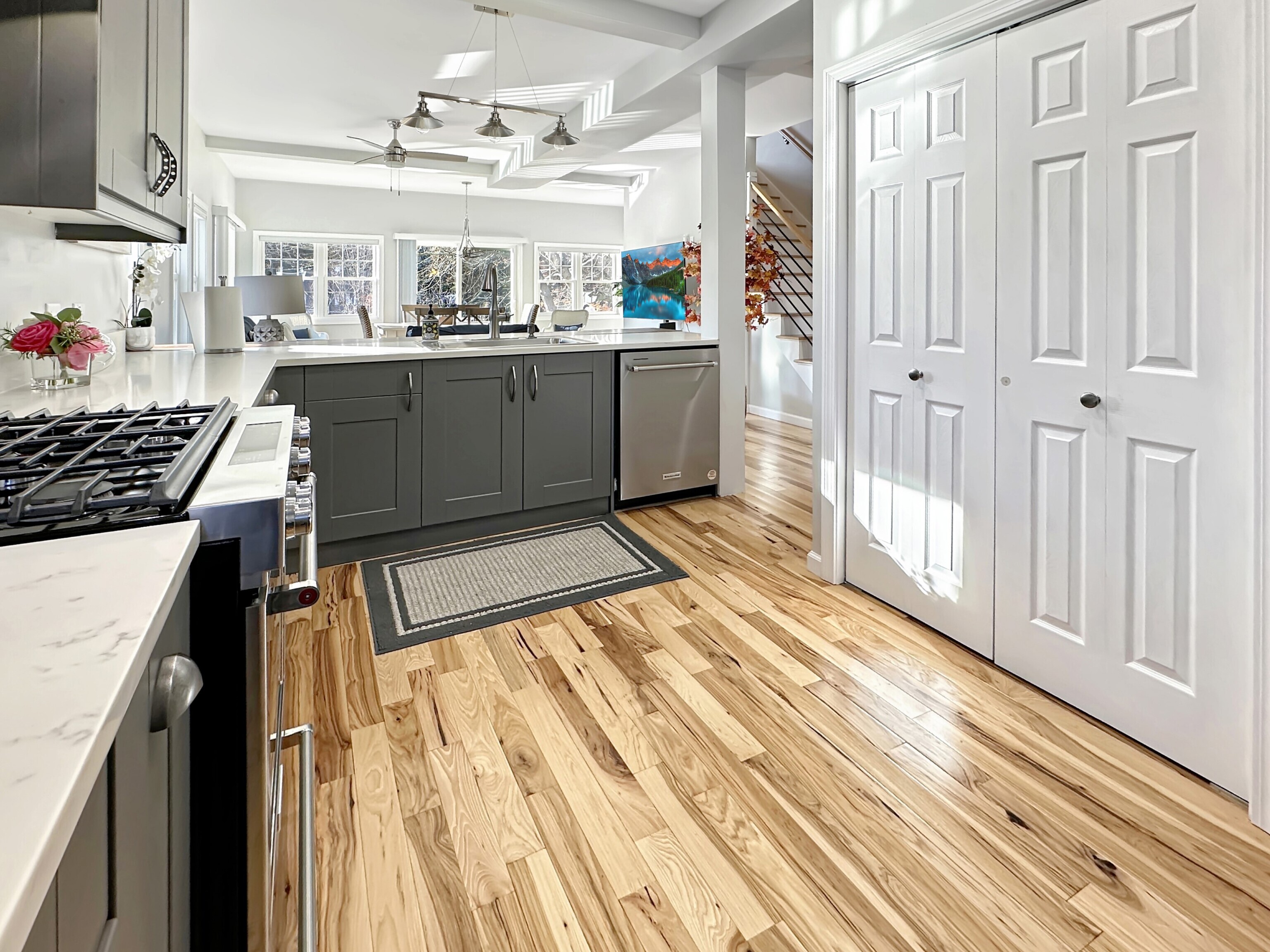 276 Niantic River Road Waterford, CT 06385 - Photo 15 of 40 a kitchen with granite countertop a sink stove and cabinets