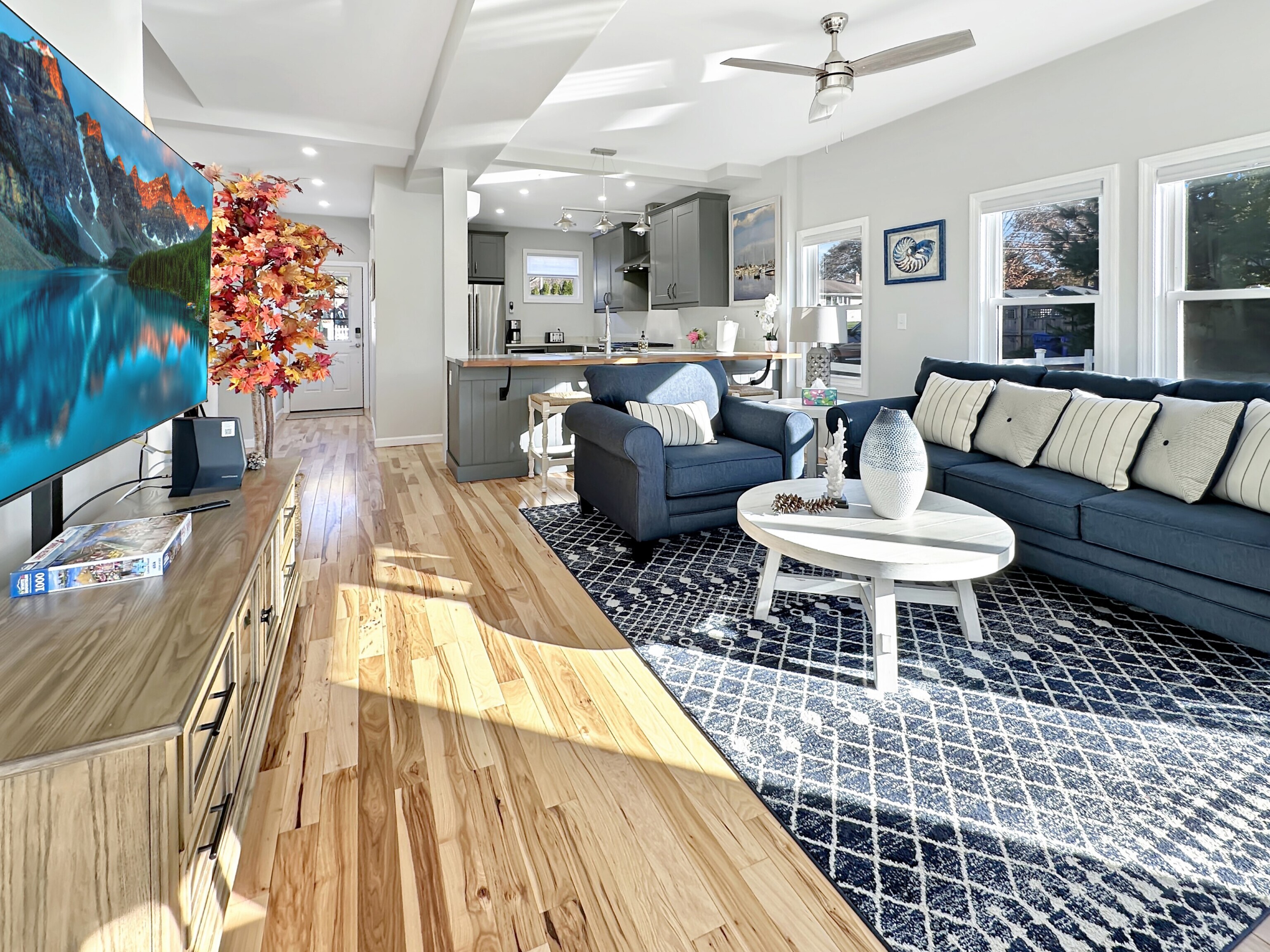 276 Niantic River Road Waterford, CT 06385 - Photo 19 of 40 a living room with furniture and a table