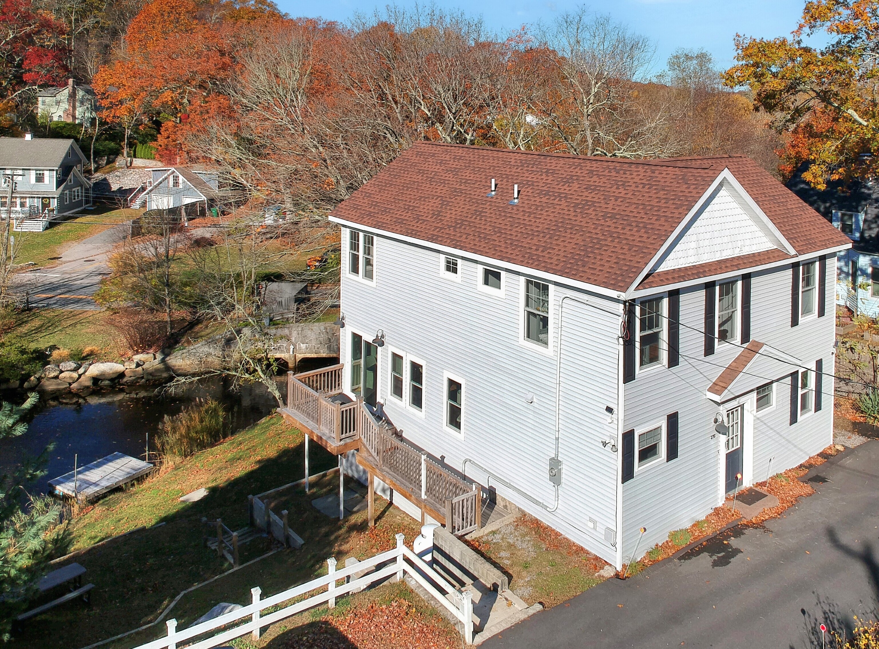 276 Niantic River Road Waterford, CT 06385 - Photo 2 of 40 an aerial view of a house with a yard