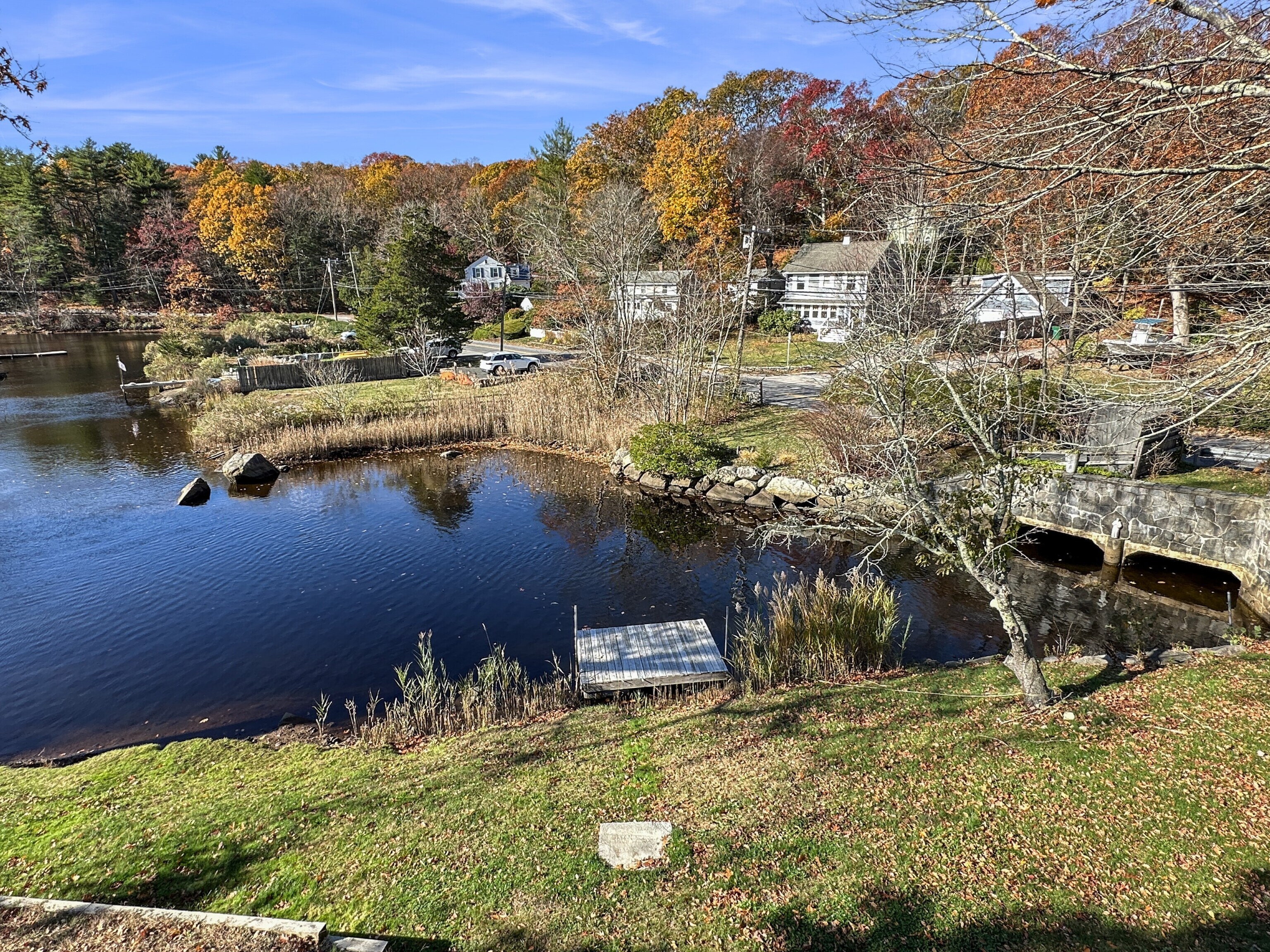 276 Niantic River Road Waterford, CT 06385 - Photo 21 of 40 a view of a lake with a mountain
