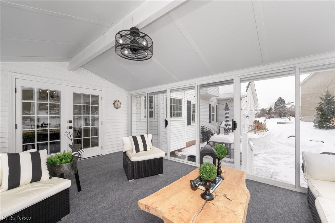 3912 Raintree Circle Uniontown, OH 44685 - Photo 20 of 49 Sunroom / solarium with french doors, beamed ceiling, and stamped concrete patio