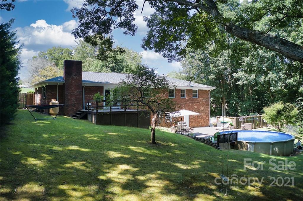 804 Hillside Street Southwest Valdese, NC 28690 - Photo 6 of 25 a view of a house with a yard porch and sitting area