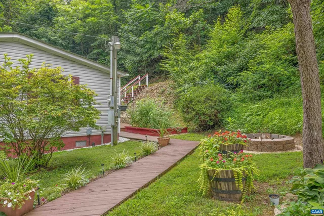 a view of a back yard with green space