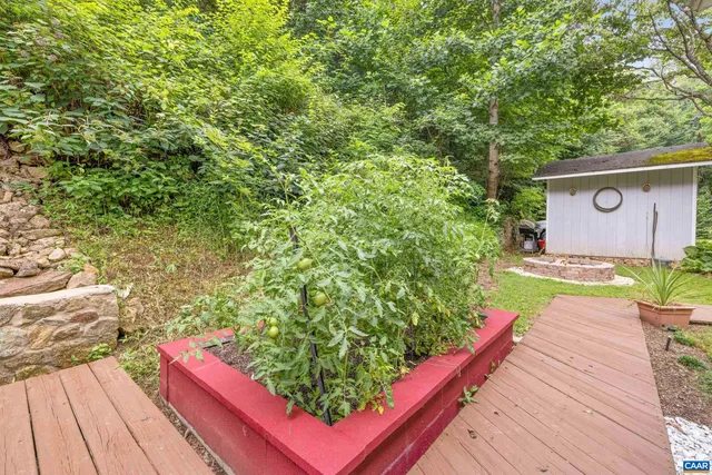 a pathway of a house with a yard
