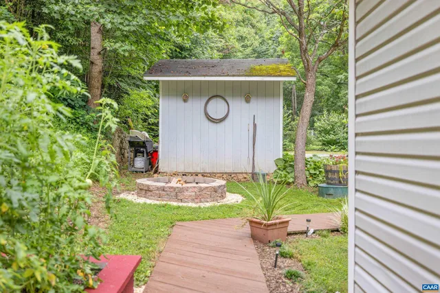 a view of a park with large trees