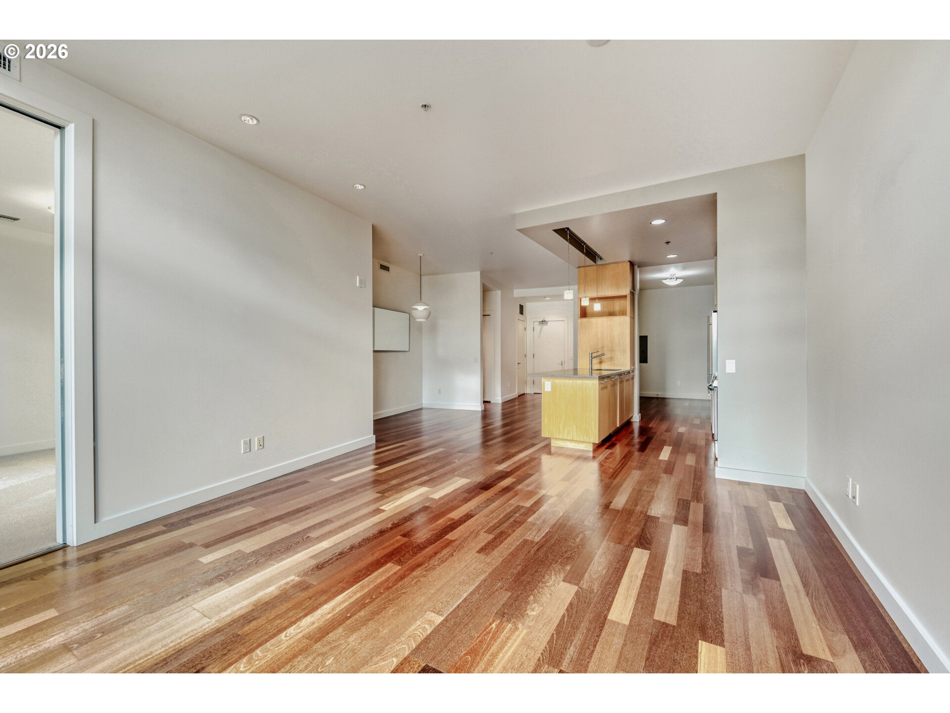 949 Northwest Overton Street, Unit 513 Portland, OR 97209 - Photo 12 of 35 a view of empty room with wooden floor