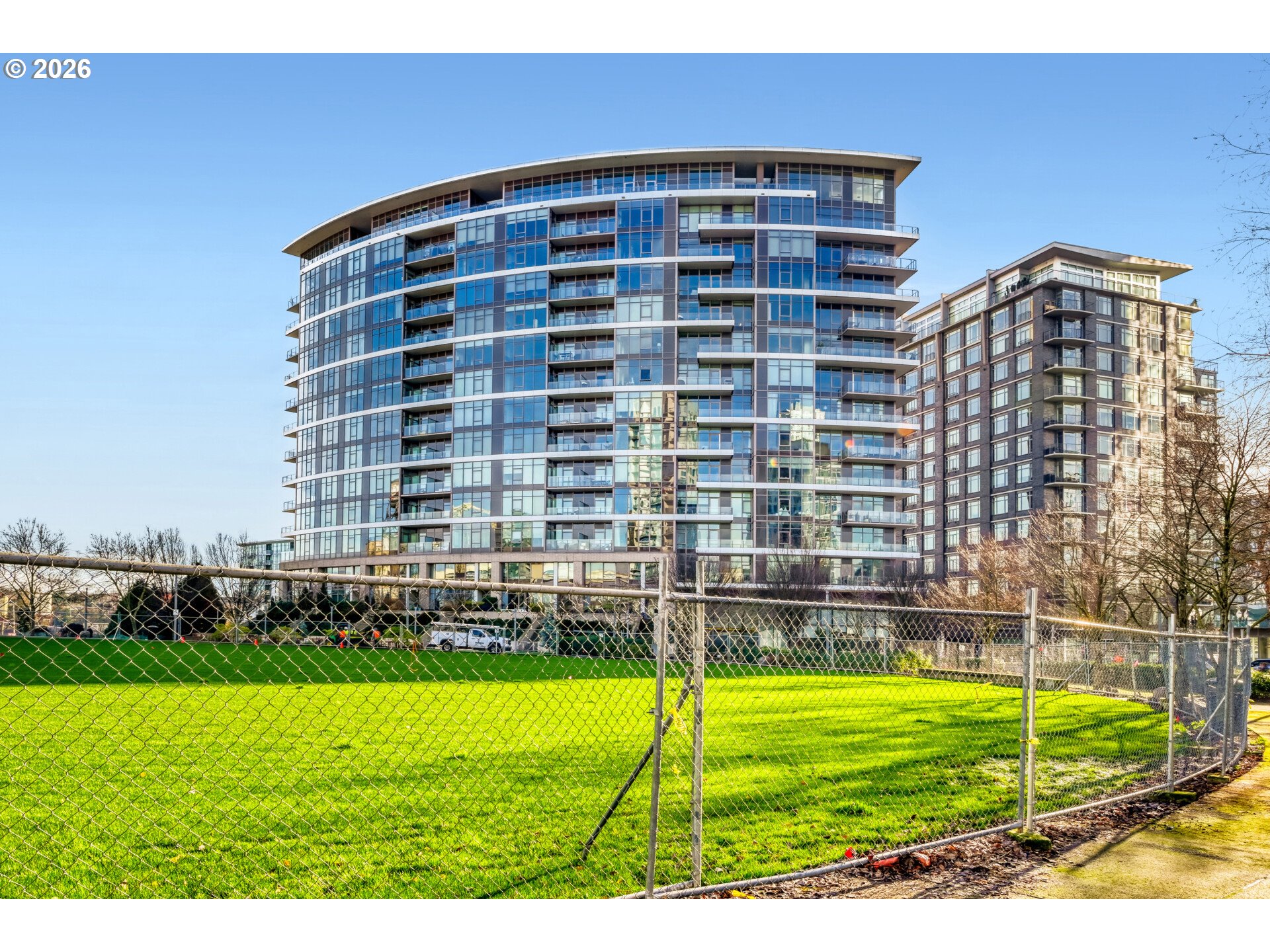 949 Northwest Overton Street, Unit 513 Portland, OR 97209 - Photo 34 of 35 a view of a big building with a yard