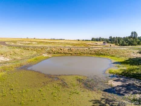 32147 Waylongood Point Kiowa, CO 80117 - Photo 3 of 19 a view of an ocean and beach