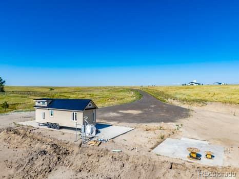 32147 Waylongood Point Kiowa, CO 80117 - Photo 5 of 19 a view of an ocean beach
