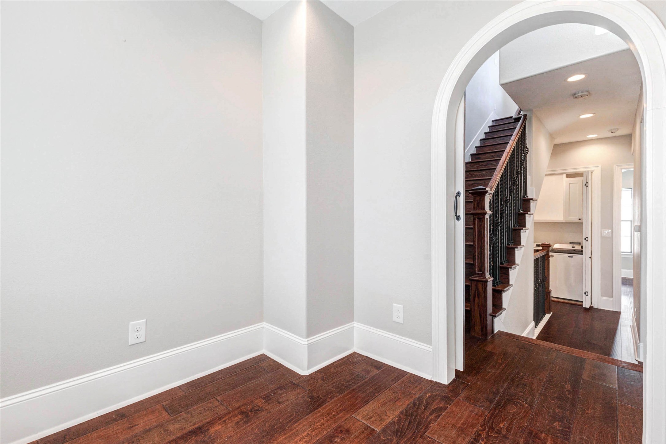 2771 Freund Street Houston, TX 77003 - Photo 21 of 25 a view of entryway with wooden floor and stairs
