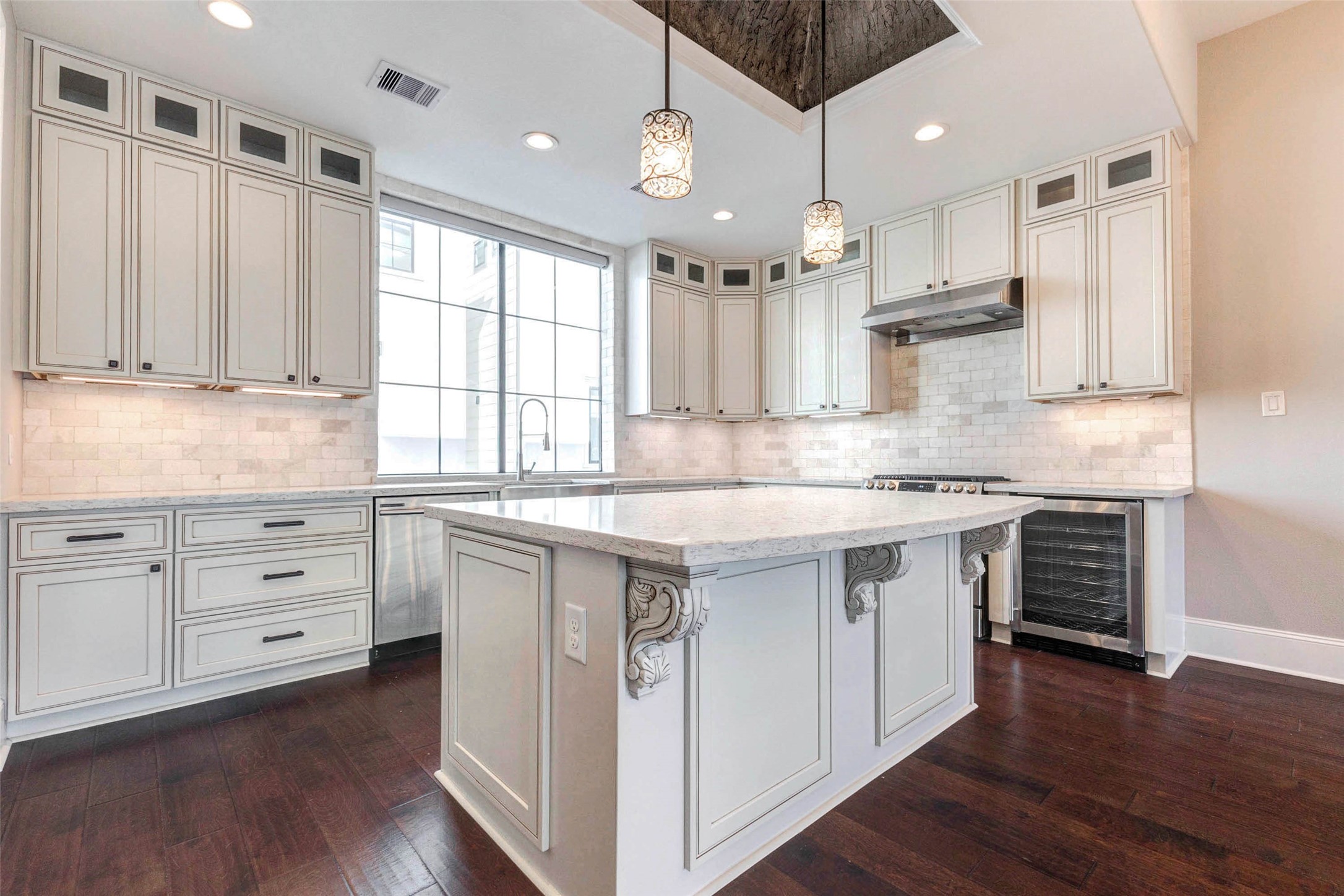 2771 Freund Street Houston, TX 77003 - Photo 6 of 25 a kitchen with granite countertop white cabinets and white appliances