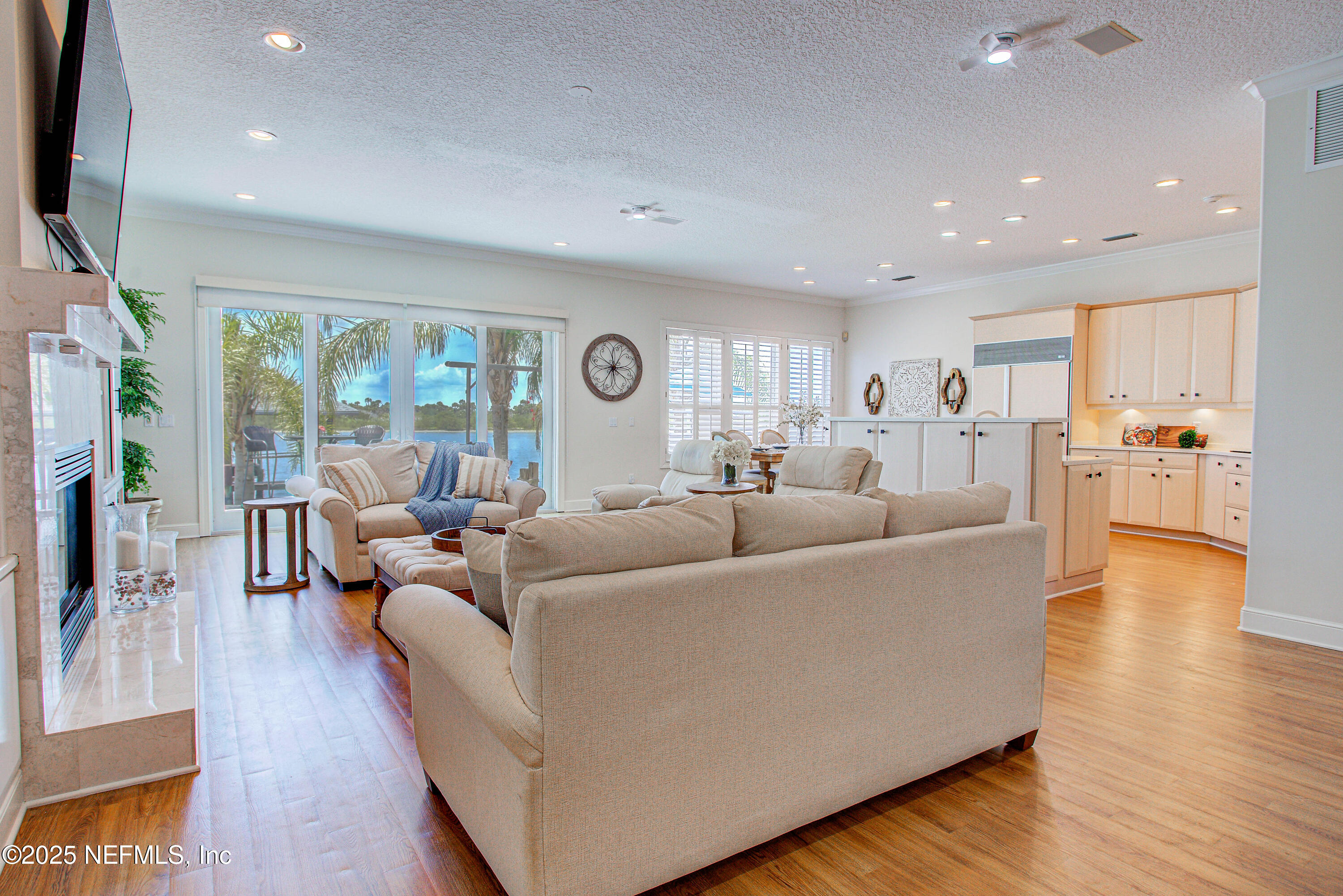 9155 June Lane St. Augustine, FL 32080 - Photo 12 of 43 a living room with furniture and a large window