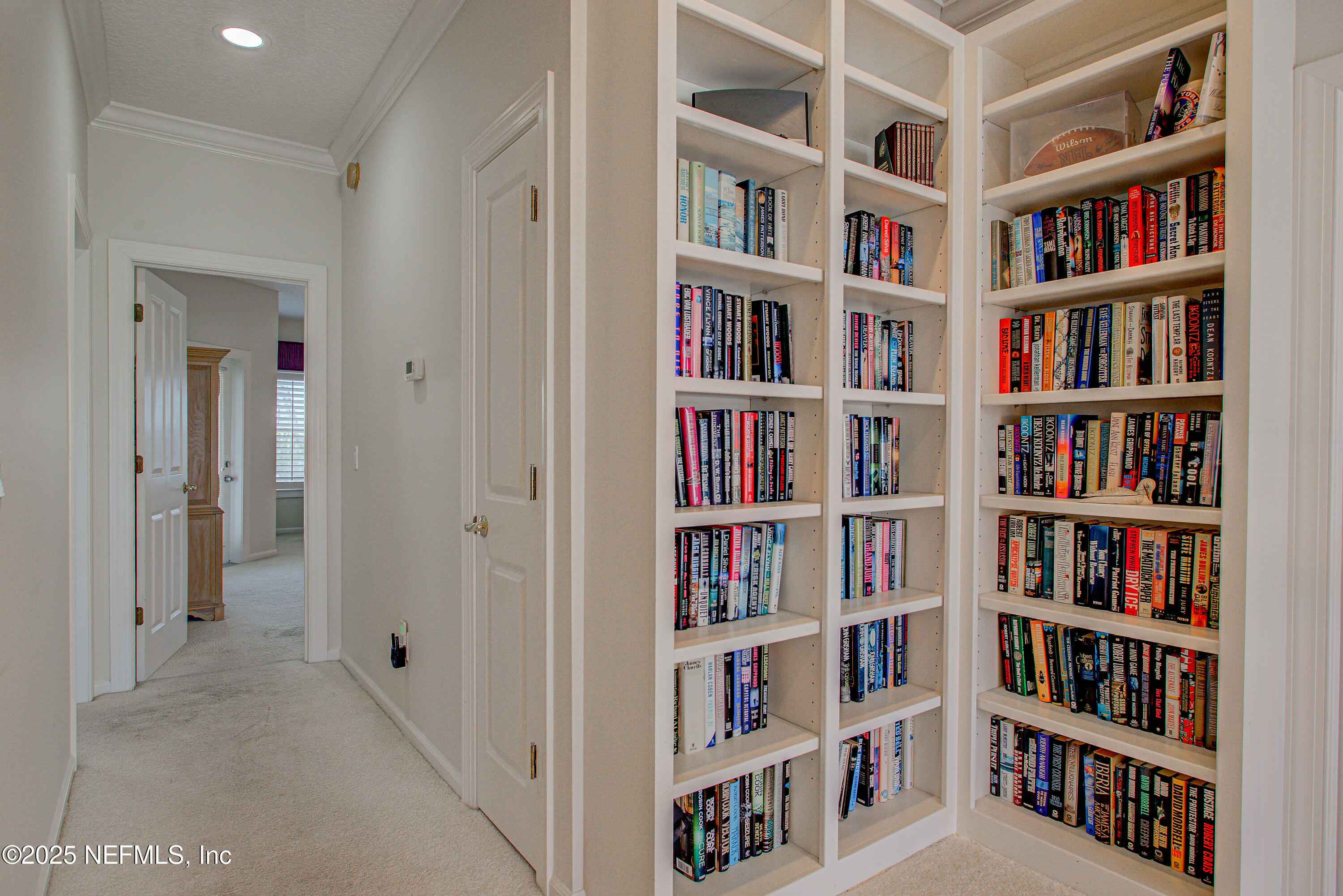 9155 June Lane St. Augustine, FL 32080 - Photo 28 of 43 a view of room with shelves
