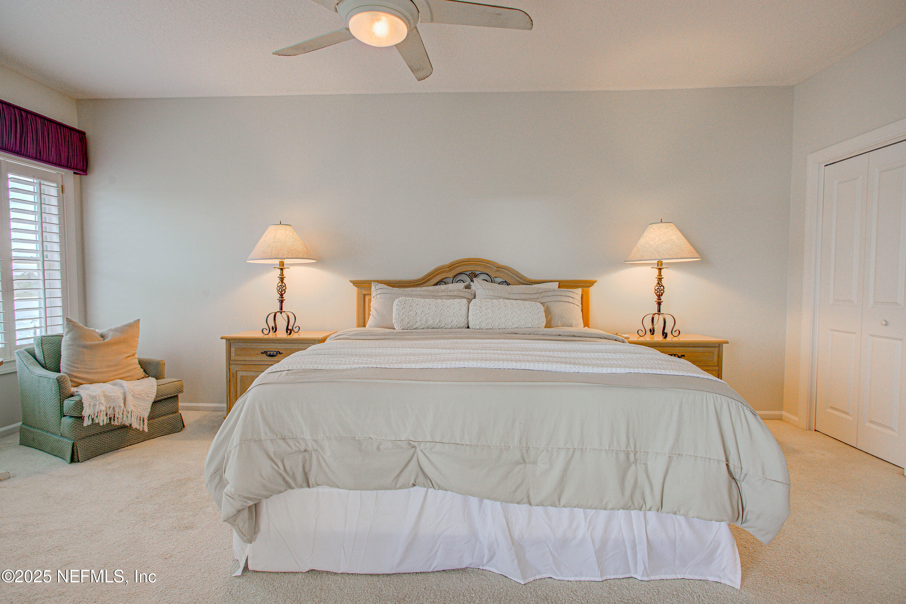 9155 June Lane St. Augustine, FL 32080 - Photo 30 of 43 a bedroom with a bed and window