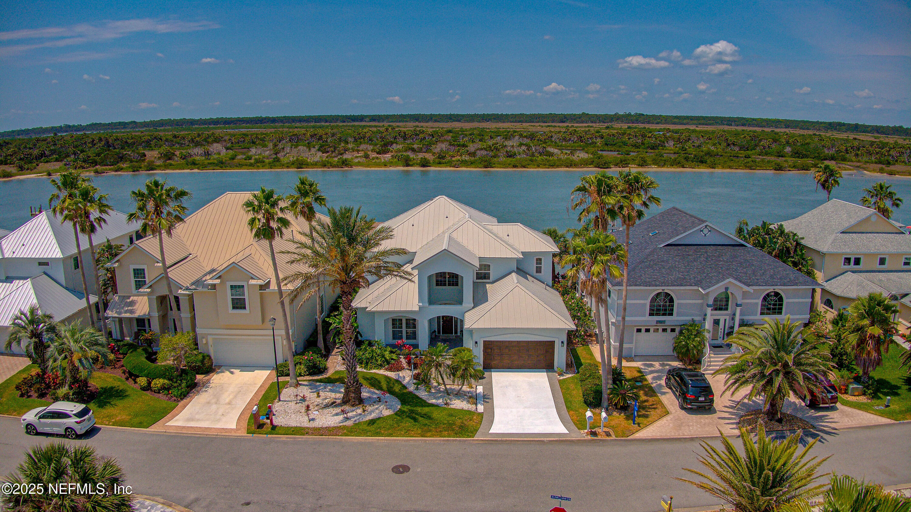 9155 June Lane St. Augustine, FL 32080 - Photo 3 of 43 an aerial view of residential houses with outdoor space and ocean view