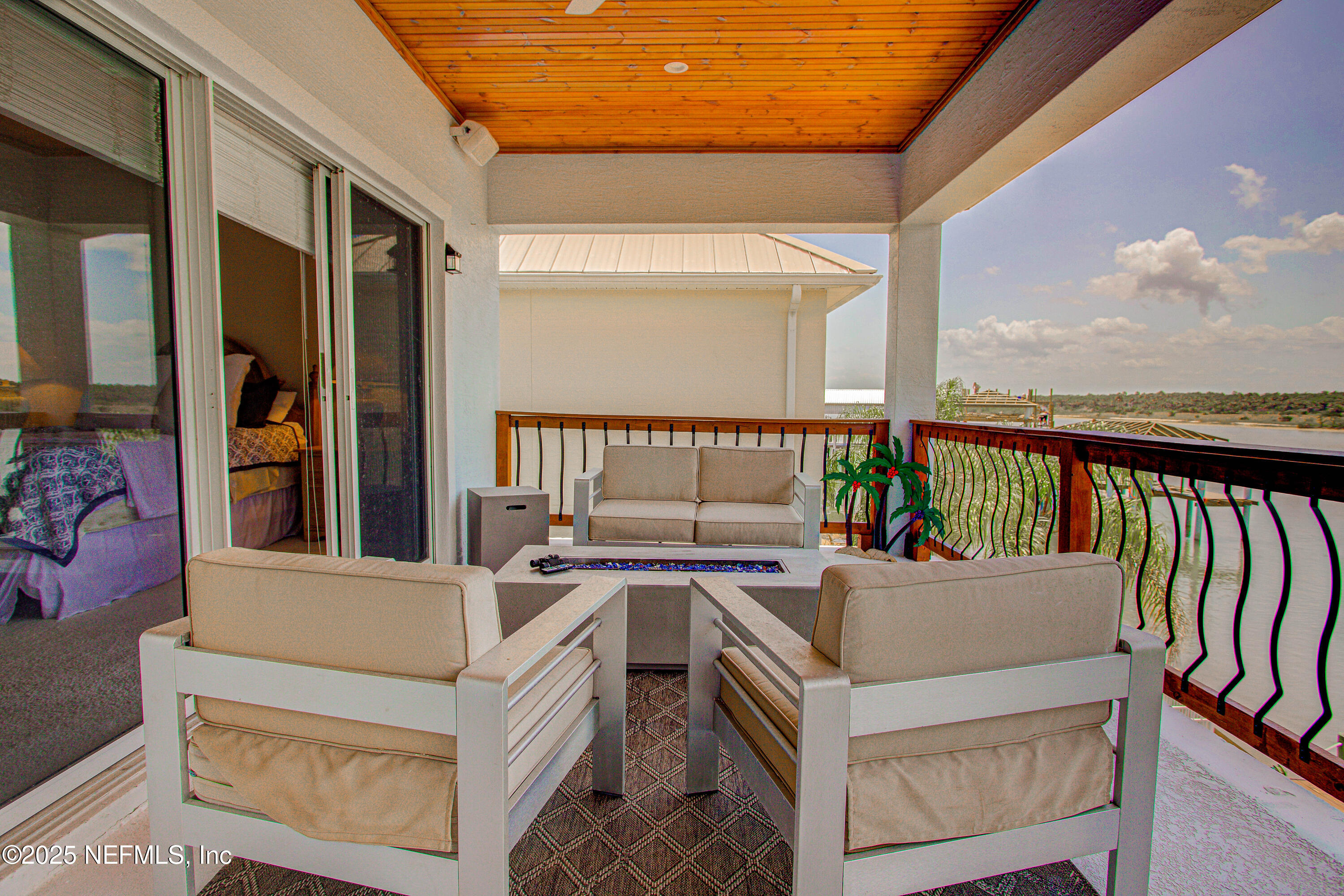 9155 June Lane St. Augustine, FL 32080 - Photo 36 of 43 a view of a balcony with furniture