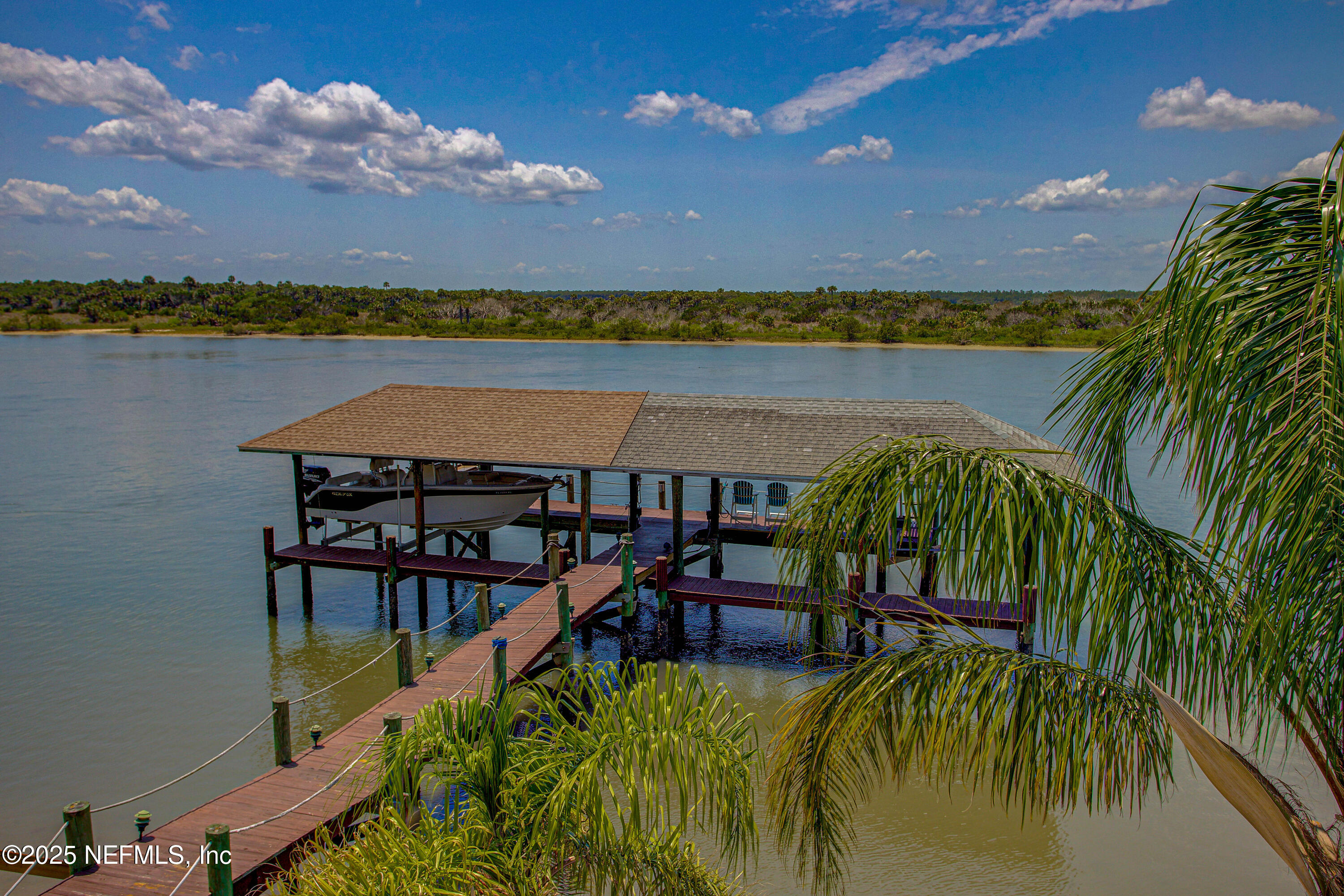 9155 June Lane St. Augustine, FL 32080 - Photo 37 of 43 a view of a chairs and table in patio