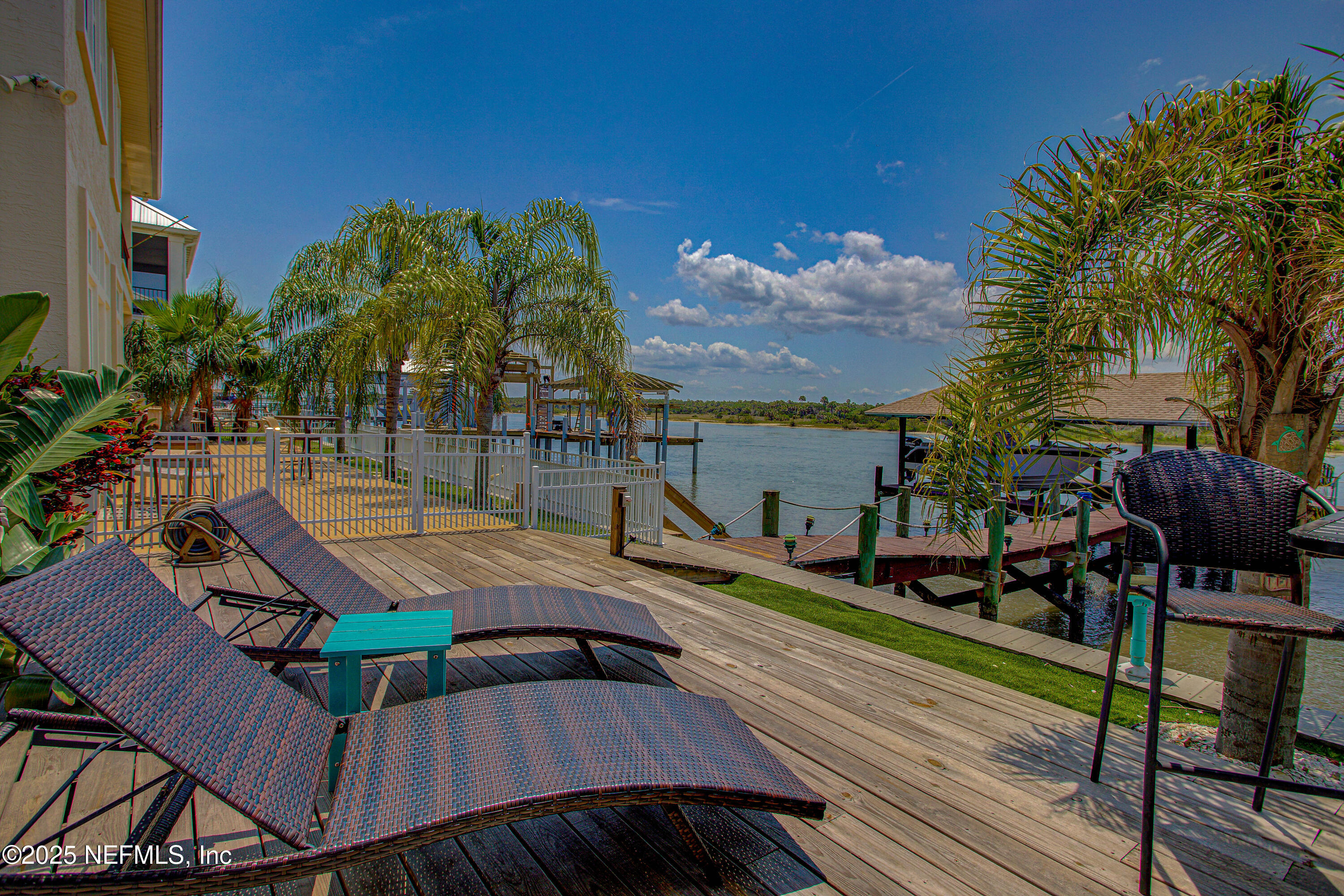 9155 June Lane St. Augustine, FL 32080 - Photo 42 of 43 a view of a chairs and table on the wooden floor