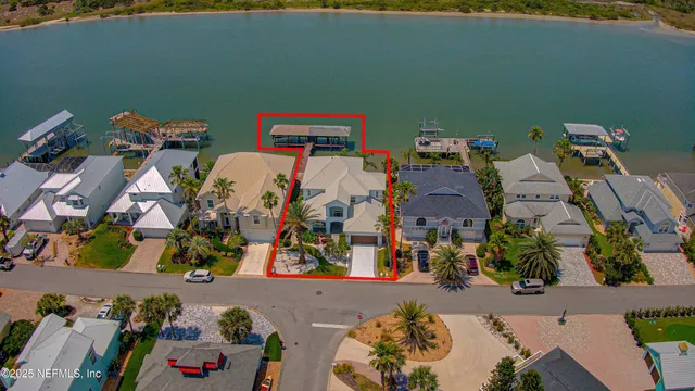 a view of a room with gym equipment and view of lake